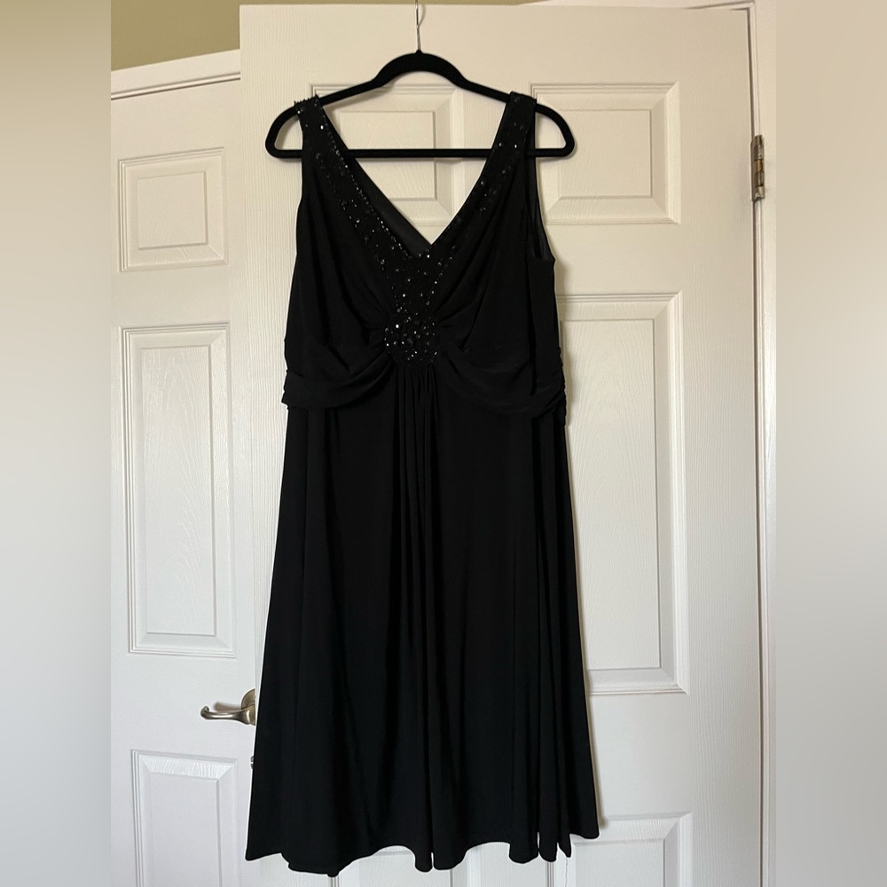 Black v cut short dress